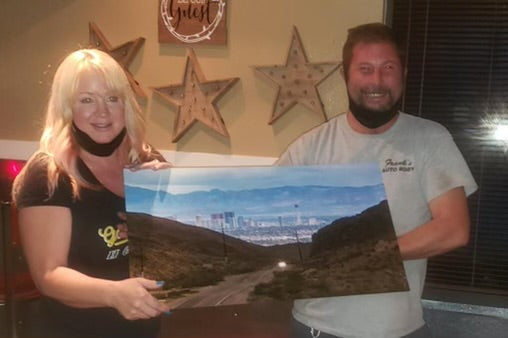 Dawn and Brad love the new picture for their new home. Wally Hawkins Photography